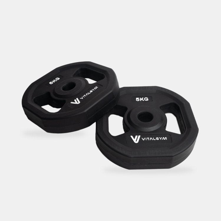 Various weight plates included in the Vital Gym Barbell Weight Set, designed for customizable strength training