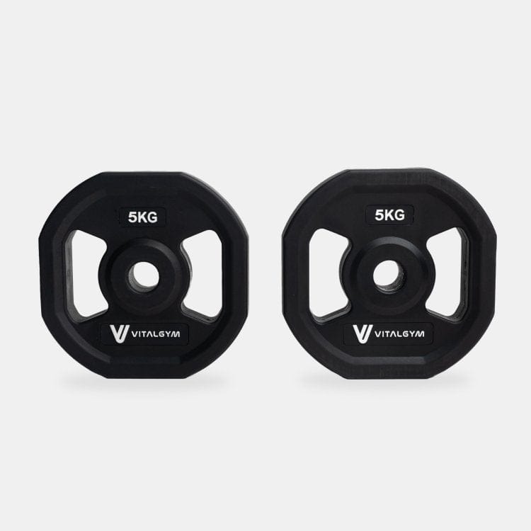 Various weight plates included in the Vital Gym Barbell Weight Set, designed for customizable strength training